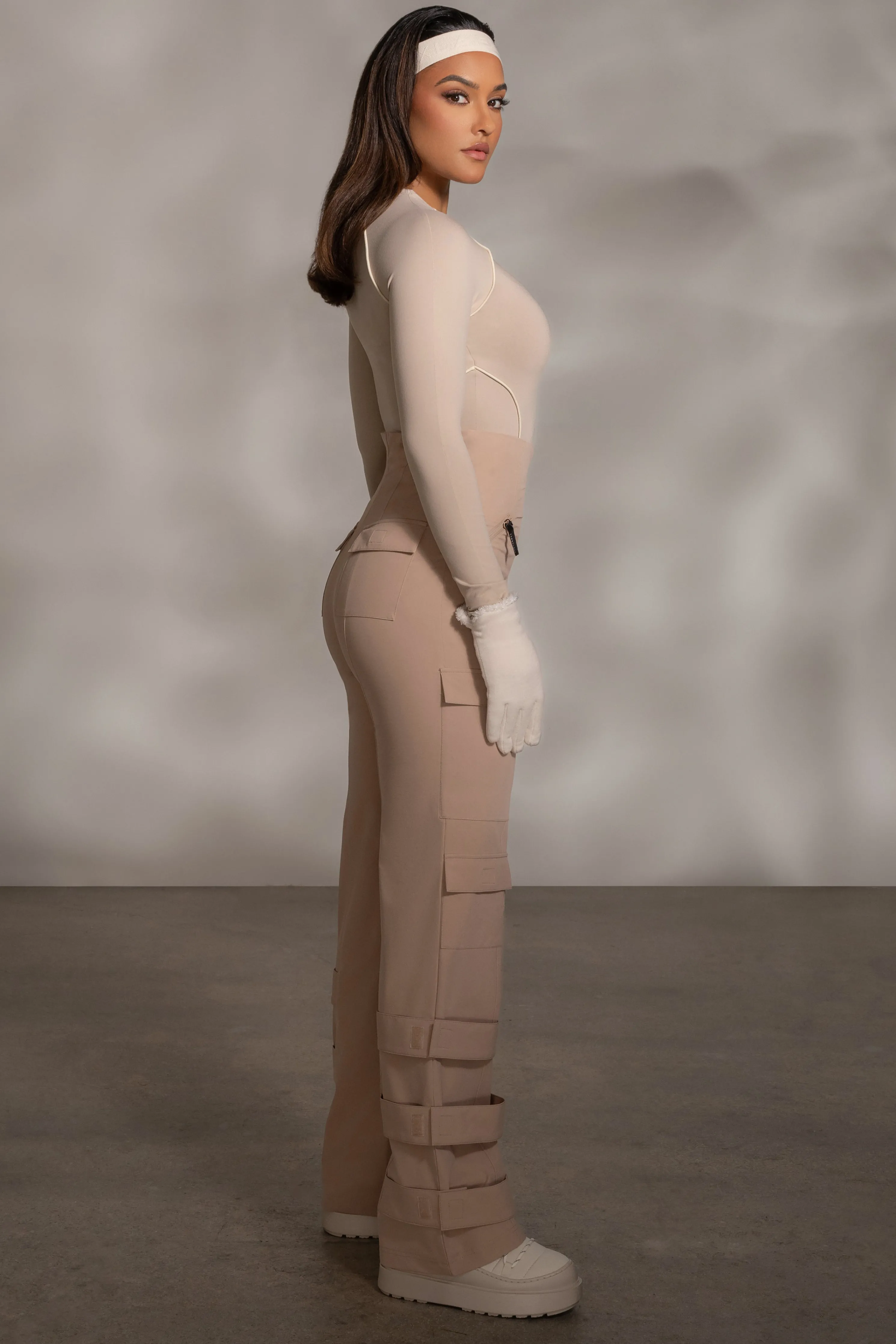 Beige Rise Up Zip Front Bodysuit